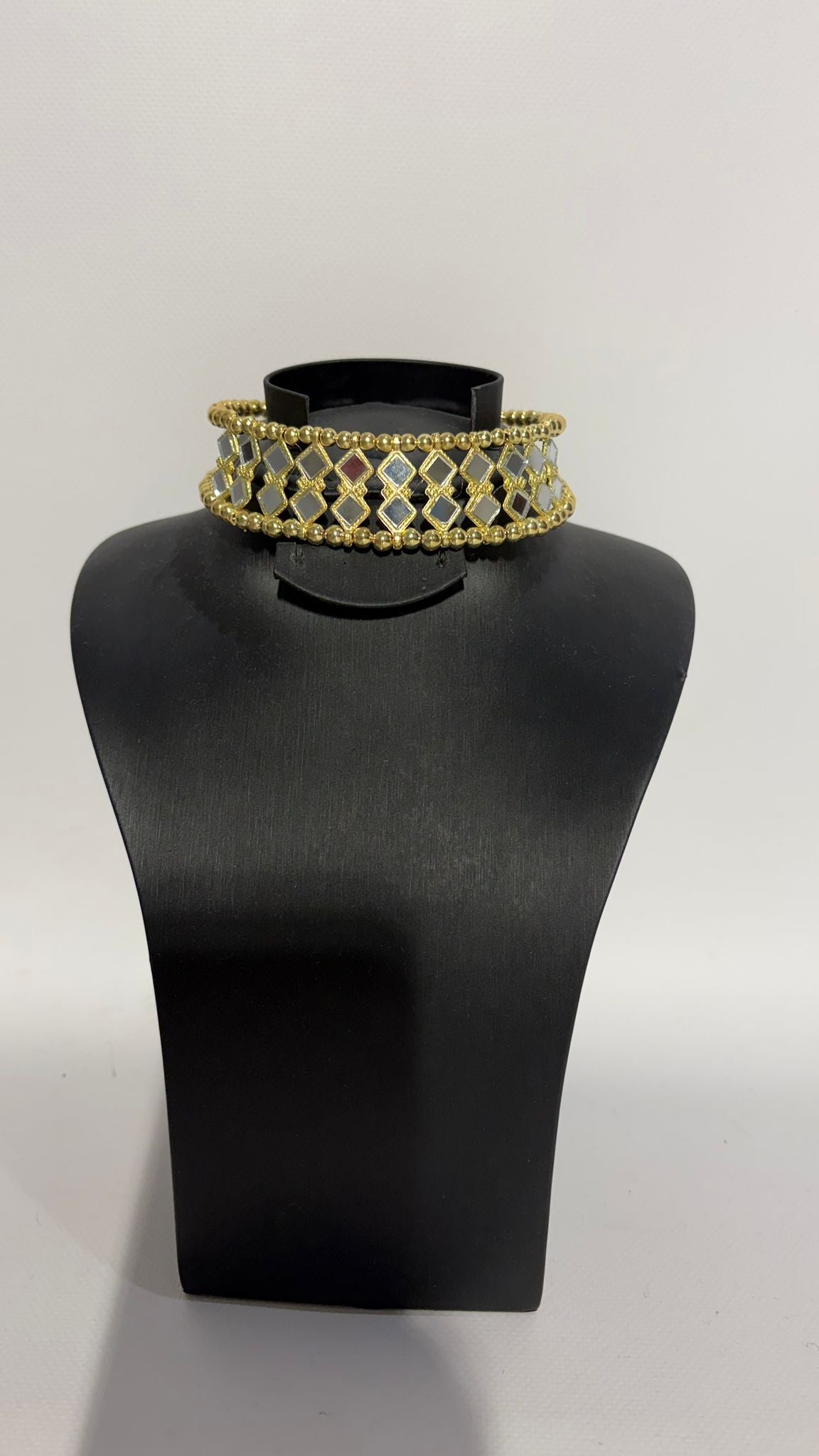 CHOCKER ESPEJO