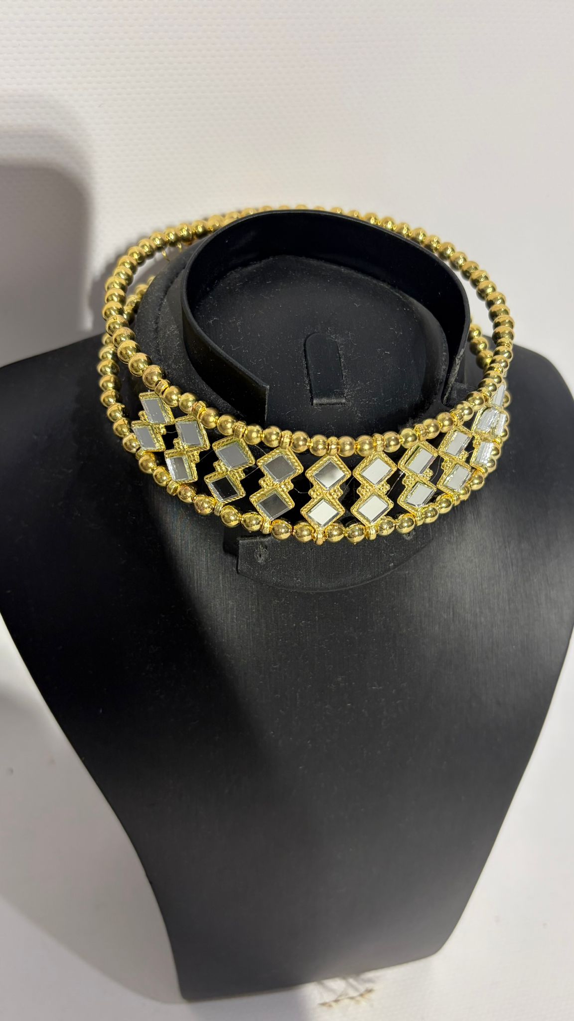 CHOCKER ESPEJO